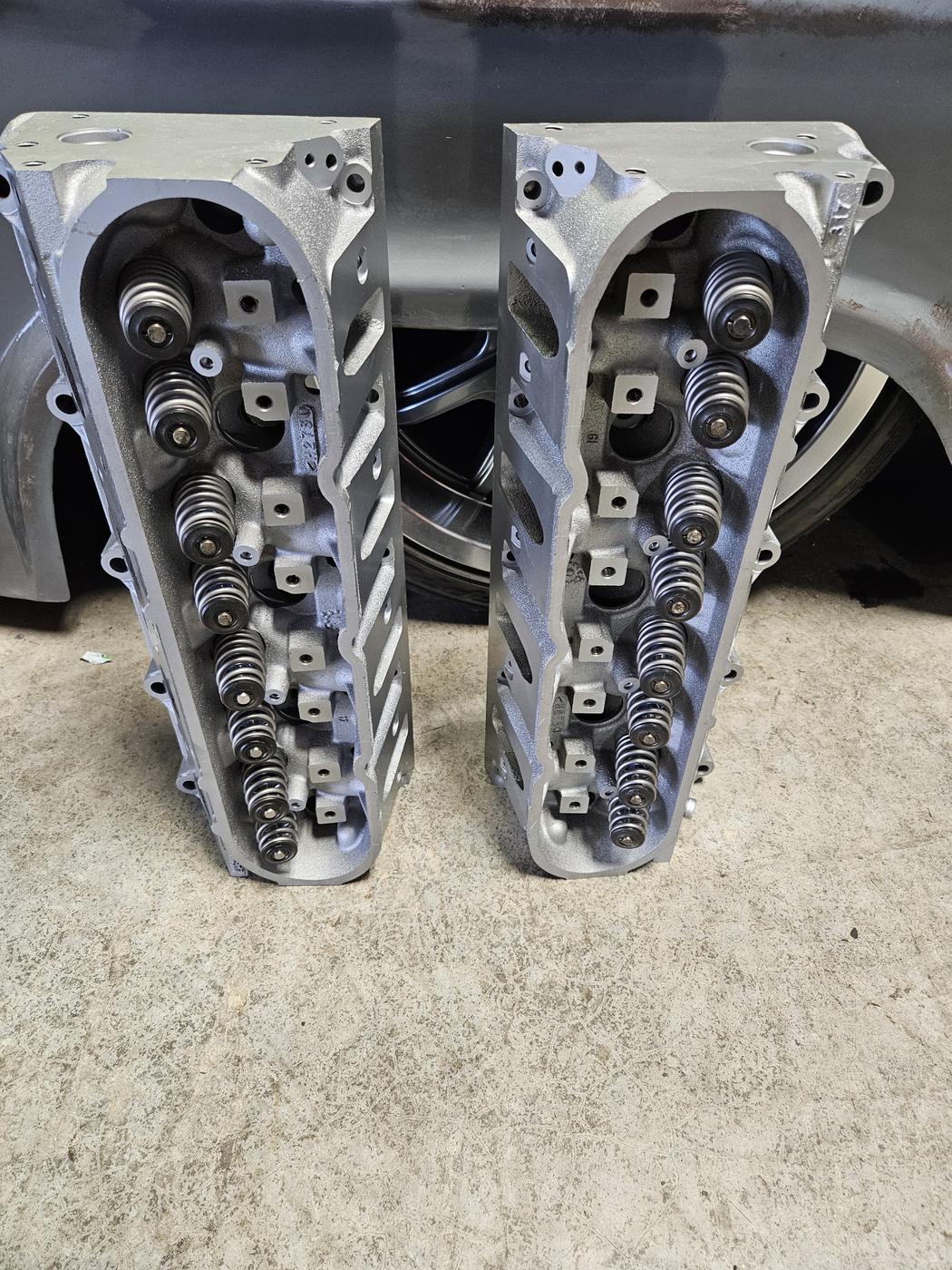 Two cylinder heads with valve springs installed